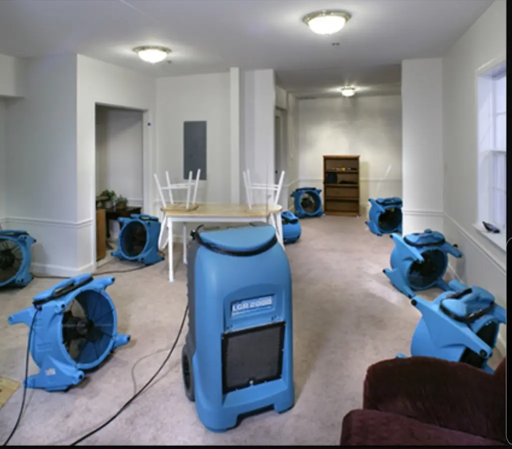 Air movers and dehumidifier setup for Water Damage Restoration in Pennsville